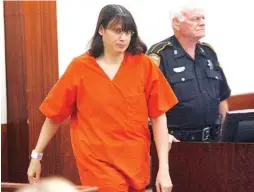  ?? ASSOCIATED PRESS FILE PHOTO ?? Andrea Yates walks into the courtroom for a hearing in 2006. Yates was committed to the maximum-security North Texas State Hospital in Vernon, Texas, for the drowning of her five children. Psychologi­sts and others who study cases of mothers accused of...