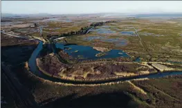  ?? NHAT V. MEYER — BAY AREA NEWS GROUP ?? The Suisun Marsh is seen in the aerial view last week. There is a proposal to drill into the Suisun Marsh for fossil fuels.