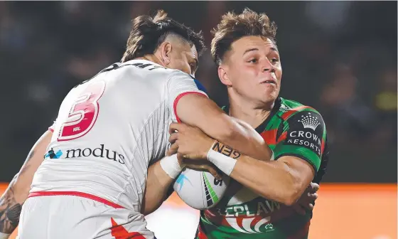  ?? Picture: Getty ?? Souths fullback Blake Taaffe is tackled by the Dragons’ Jack Bird at Sunshine Coast Stadium.