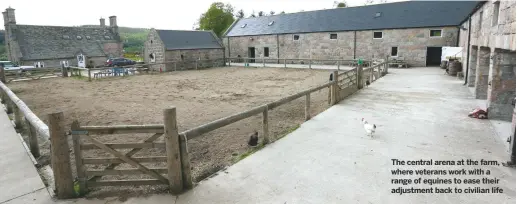  ??  ?? the central arena at the farm, where veterans work with a range of equines to ease their adjustment back to civilian life