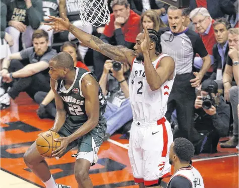  ?? POSTMEDIA ?? Kawhi Leonard’s thunderous dunk capped a Toronto Raptors come-from-behind victory over the Milwaukee Bucks on Saturday night, sending the team into the NBA finals for the first time. The Raptors will play the Golden State Warriors for the title.