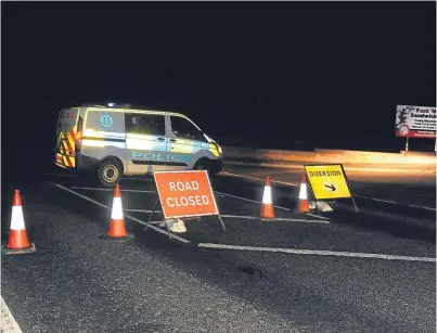  ?? Picture: David Wardle. ?? The road was closed for several hours following the fatal accident, with traffic diverted via Kincaple.