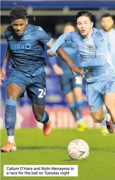  ??  ?? Callum O’Hare and Rolin Menayese in a race for the ball on Tuesday night