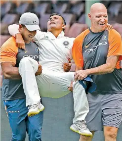  ?? — AP ?? Members of India’s fitness staff carry Prithvi Shaw off the field after the opener injured his ankle during a tour game in Sydney on Friday.