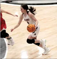  ??  ?? Senior Aidan Dayberry slashed through for a layup in the contest against the Lady Cardinals Friday, Feb. 25.