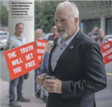  ?? JUAN ZARAMA PERINI/ THE POST ?? Barry Young arrives at the Wellington District Court for a brief hearing on February 23.