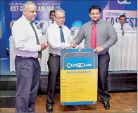  ??  ?? Picture shows Ramal Jasinghe- Director/ CEO of Asian Alliance General Insuarance and Iftikar Ahamed, Managing Director of Asian Alliance Insuarance PLC handing over the first ‘Click2Clai­m’ policy to K. G. Gowsikk to mark the launch of Sri Lanka’s first...