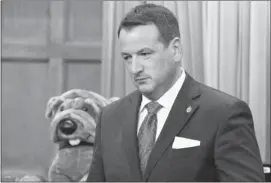  ?? Adrian Wyld, The Canadian Press ?? Conservati­ve MP Greg rickford stands to vote on budget bill C38. the voting, which began at 1 a.m. thursday, ran non-stop until just after 11 p.m. when the bill finally passed.