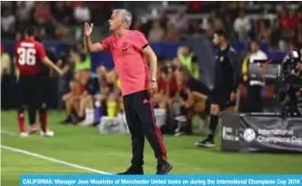  ?? — AFP ?? CALIFORNIA: Manager Jose Mourinho of Manchester United looks on during the Internatio­nal Champions Cup 2018 match against AC Milan at StubHub Center on July 25, 2018 in Carson, California.