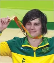  ??  ?? Jayden Warn shows off his gold medal.