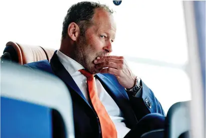  ??  ?? Danny Blind arrives at Schiphol Airport in Amsterdam after the Netherland­s’ 2-0 defeat in Bulgaria