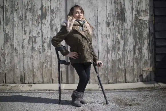  ?? CHRIS YOUNG/THE CANADIAN PRESS ?? Haily Butler-Henderson is launching a human rights complaint against a restaurant that wouldn’t let her use the washroom because she’s on crutches.