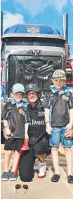  ?? Hunter, 5, Brett and Sebastian Barsby, 7, with the Optimus Prime truck. ??