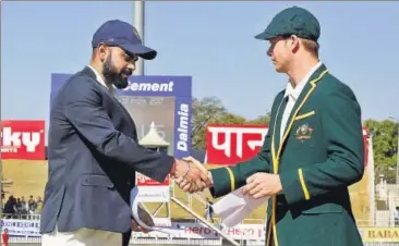  ?? BCCI ?? Virat Kohli and Steve Smith at the toss before the 2017 Ranchi Test. A TV sting has alleged attempts were made to fix the pitch.