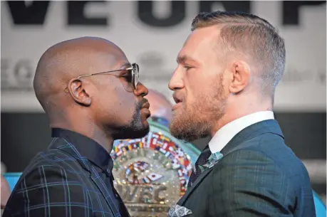  ?? JOHN LOCHER, AP ?? Defeats have been rare for Floyd Mayweather Jr., left, and Conor McGregor. Both vow to continue that trend Saturday.