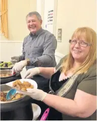  ??  ?? Grub up John and Tina Wren serve up food