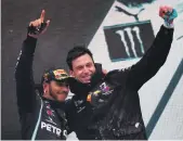  ?? PA ?? Toto Wolff, right, described Lewis Hamilton’s performanc­e at the Portugal Grand Prix as ‘immaculate’