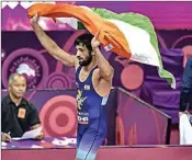  ??  ?? Ravi Dahiya gave India the first free style gold medal of this edition with a commanding show