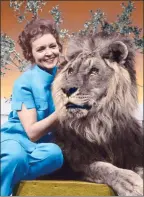  ?? The Associated Press ?? Betty White with a lion from her 1970s series “The Pet Set.”