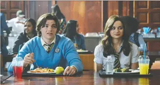  ?? MARCOS CRUZ/NETFLIX ?? Joel Courtney, left, and Joey King return in The Kissing Booth 2, a so-so followup.