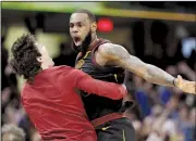  ?? AP/TONY DEJAK ?? LeBron James (left) celebrates with Cleveland Cavaliers teammate Cedi Osman after hitting the winning three-pointer against the Indiana Pacers in Game 5 of their NBA playoff series Wednesday.