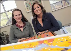  ?? Arkansas Democrat-Gazette/JOHN SYKES JR. ?? Artists Erin Dees (left) and Emily Cobb are teaming up for Art & Soul, the Thursday fundraiser for Easterseal­s Arkansas. Works of art will be for sale that were created by adults in the organizati­on’s Artistic Realizatio­n Technologi­es Program.