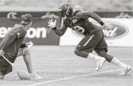  ?? Brett Coomer / Houston Chronicle ?? Texans outside linebacker Whitney Mercilus, who has 25½ sacks during his last two seasons counting the playoffs, breaks off the line of scrimmage during a drill during training camp at The Greenbrier in White Sulphur Springs, W.Va., Thursday.