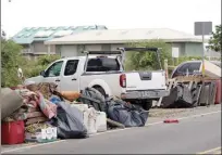  ?? The Maui News / COLLEEN UECHI photo ?? Mattresses, pillows and other belongings line Amala Place last month before Maui County cleaned the area. Dozens of people had been living along the Kahului street near Kanaha Beach Park.