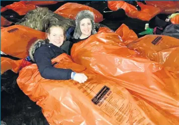  ??  ?? Top team Staff from Forde Opticians brave the cold in aid of the homeless at Kelvingrov­e Park