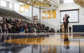  ?? CHANCEY BUSH/JOURNAL ?? Bernalillo County District Attorney Sam Bregman holds an assembly on gun violence Wednesday at Highland High School. Bregman announced Tuesday his office will insist that juveniles involved in gun-related crimes divulge where they got the gun before receiving a plea deal. There are 14 pending or open cases involving someone bringing a gun on campus in Bernalillo County, 11 of those involving students.