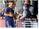  ??  ?? Tribute…Tevez celebrates with Maradona after his title-winning goal