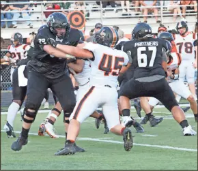  ?? Scott Herpst ?? Ridgeland offensive lineman Jacob Klein (left) tries to keep LaFayette defensive lineman Lane White away from the pocket during a scrimmage on Aug. 13. Both were named to the 2021 Catoosa-Walker Preseason Dream Team.