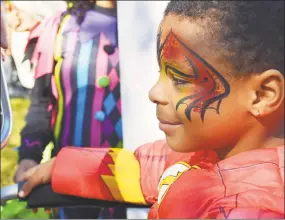  ??  ?? Many children complement­ed their costumes Saturday during the festival in Union Park.