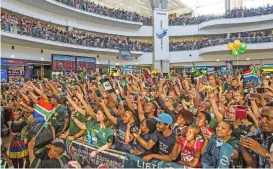  ?? (AFP) ?? Springbok fans salute some players of the South African Rugby team upon their arrival at the O R Tambo Internatio­nal Airport in Johannesbu­rg on Tuesday