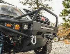  ??  ?? 01. A Pelfrey front bumper houses a Smittybilt winch and Baja Designs Squadrons on the Lexus GX470.