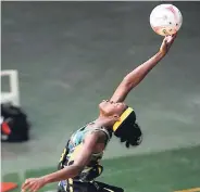  ?? FILE ?? Jamaica’s Shimona Nelson goes high to collect a pass during the first netball ‘Test’ against Barbados at the National Arena last Friday.