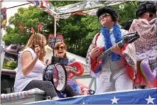  ?? ANNE NEBORAK-DIGITAL FIRST MEDIA ?? One of the floats at the 2016 East Lansdowne Parade featured Elvis’ impersonat­ors.