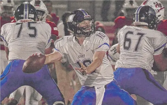  ?? | WORSOM ROBINSON/ FOR THE SUN- TIMES ?? Quarterbac­k Brendan Morrissey and the top- ranked Lincoln- Way East Griffins will put their undefeated record on the line at Bolingbroo­k on Friday.