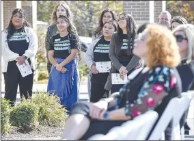  ?? (River Valley Democrat-Gazette/Hank Layton) ?? Interviewe­rs for the Hamilton Center for Child Advocacy listen with other guests Wednesday during an open house at the center outside Mercy Hospital in Fort Smith.