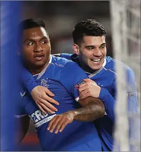  ??  ?? Alfredo Morelos, left, impressed in both legs against Royal Antwerp