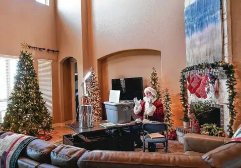  ?? Photos by Billy Calzada / Staff photograph­er ?? Harvey Manning, a semiretire­d educator, speaks with a child from his San Marcos home. He works through Hondo-based Virtual Santa Visits.