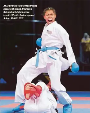  ??  ?? AKSI Syakilla ketika menentang peserta Thailand, Paweena Raksachart dalam acara kumite Wanita Berkumpula­n Sukan SEA KL 2017.