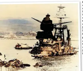  ?? ?? Left: Burned out and sunk on 10 December, the USS California sustained nine torpedo hits during the Japanese raid (Official US photograph)
Right: USS Arizona Memorial aerial view in 2002 (James Pastoric, USN)