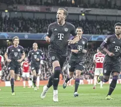  ?? ?? Harry Kane celebrates scoring from the penalty spot against Arsenal