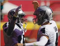  ?? CHARLIE RIEDEL — THE ASSOCIATED PRESS ?? Raiders receiver Nelson Agholor, left, celebrates with QB Derek Carr after catching a 59-yard TD pass in the Oct. 11win over the Chiefs.