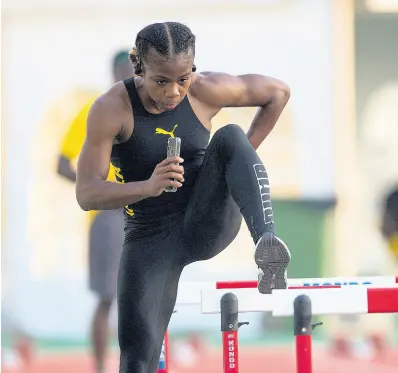  ?? GLADSTONE TAYLOR ?? Megan Tapper goes through a training session at the Qatar Sports Club in Doha, Qatar, on September 23, 2019, during the World Championsh­ips.