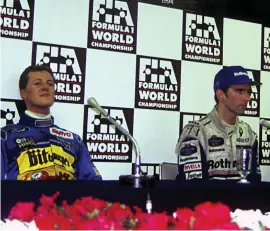  ?? GETTY ?? Michael Schumacher and Damon Hill at a post-race press conference in Adelaide following the controvers­ial incident which helped the German win the 1994 title