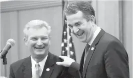  ?? STEVE HELBER/ASSOCIATED PRESS ?? Gov. Ralph Northam, right, and Secretary of Finance Aubrey Layne, seen in this 2018 file photo, have emphasized fiscal discipline in the governor’s budget proposal, released on Wednesday.