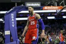  ?? MATT SLOCUM — THE ASSOCIATED PRESS ?? Sixers guard Ben Simmons screams after being fouled during last Friday’s game against the Denver Nuggets in Philadelph­ia.