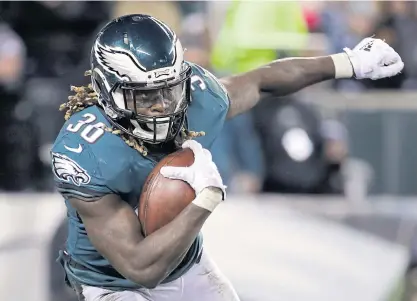  ??  ?? Eagles running back Jay Ajayi carries the ball during a recent game.